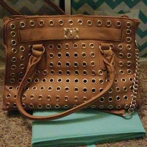 Tan and gold purse